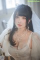 Coser@rioko凉凉子 Vol.073: 透明婚纱 (39 photos)